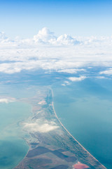 Wall Mural - looking through window aircraft, landing to the airport