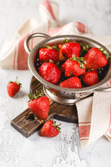 Wall Mural - Fresh strawberries in a while colander