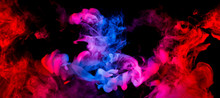 Fusion Of Blue And Red Smoke In Motion Isolated On Black Background