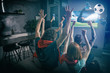 © alphaspirit - Group of friends watch the game together on television and rejoice