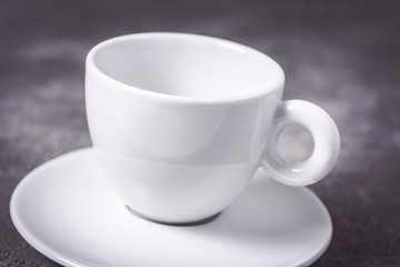 Empty White Espresso Coffee Cup on Dark Background