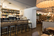 © Alvaro Hernandez/ADDICTIVE STOCK - Counter and stools of small bar inside stylish cozy restaurant