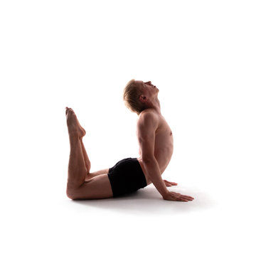 Yoga alphabet. The letter U formed by gymnast body