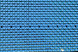 © Casual-T - Looking upward at the sky, through a metal grid