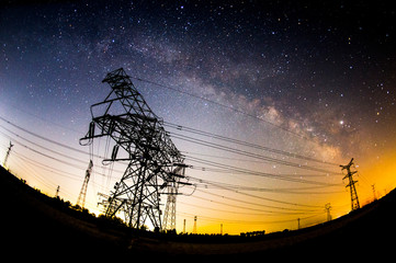 The outline of the power supply facilities and stars at night