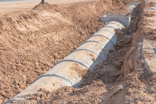 Concrete Drainage Pipe On A Construction Site, Concrete Drainage Tank On Construction Site, Construction Site At The Road