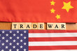 Maski, India 29,May 2019 : China-US trade war concept - flag of China and the United States with wooden block lettes