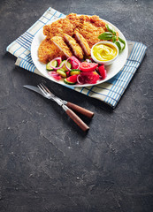 Canvas Print - close-up of tasty Parmesan breaded chicken fillets