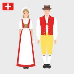 Wall Mural - Swiss in national costume with a flag