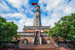 Nam Dinh flag tower with Vietnamese flag on top. This tower is one of the symbols of the city and part of the Nam Dinh Citadel. A well known destination for tourist in Nam Dinh, Vietnam