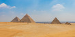 Egyptian pyramids with a beautiful sky at Giza in Cairo