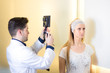 © GENETTICA - Doctor taking profile picture of the patient before the treatment of aesthetic medicine