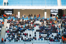 Blurred Crowd Of Spectators On A Stadium