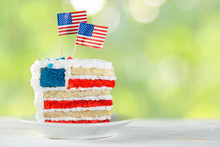 American National Holidays Concept - 4th Of July, Memorial Day, Labour Day. Layered Spounge Cake In USA Flag Colours, Rustic Background, Copy Space