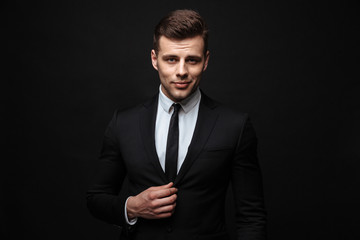 Canvas Print - Handsome confident businessman wearing suit