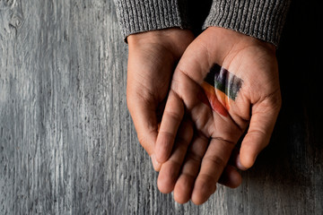 Sticker - person with a rainbow flag in his or her hand