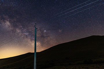 Wall Mural - power line against the night starry sky