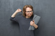 © Andrei Korzhyts - Portrait of angry woman swinging with fist
