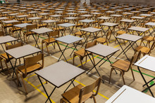 Exam Tables Set Up In A Sports Hall For Exams In A High School & Sixth Form