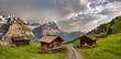 Swiss beauty, chalets on meadows above Grindelwald,Bernese Oberland,Switzerland,Europe