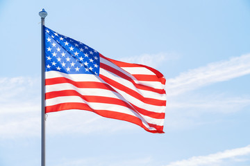 American flag against blue sky