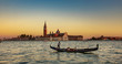 Italy beauty, sunset with gondola and San Giorgio Maggiore island in Venice, Venezia