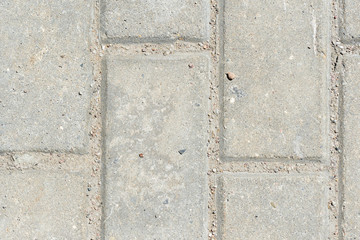 Gray paving slabs texture close up. Paving slabs background