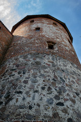 An old tower built of red brick.Tower in a small town in Central Europe.