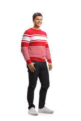 Smiling young man in a red sweater