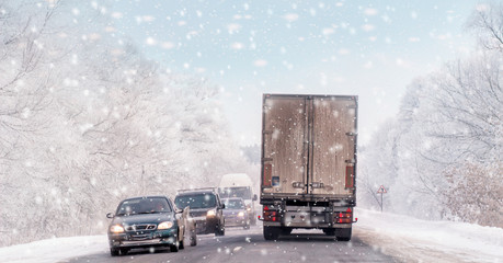 Wall Mural - Driving in snow storm on bad winter Road