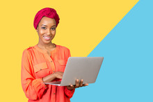 African American Woman Holding Laptop