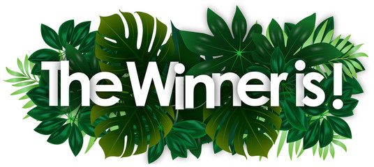 Wall Mural - The winner is word and green tropical’s leaves background