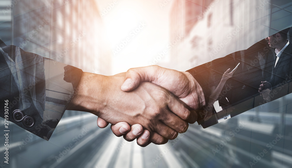 Double exposure image of business people handshake on city office building in background showing partnership success of business deal. Concept of corporate teamwork, trust partner and work agreement. - obrazy, fototapety, plakaty 