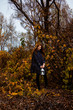 © Julia - young redhead woman with white lamp in the hand in autumn park