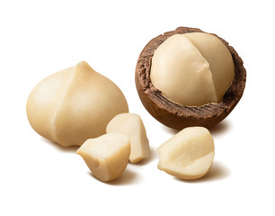 Wall Mural - macadamia nuts and pieces. peeled and in nutshells. isolated on white background