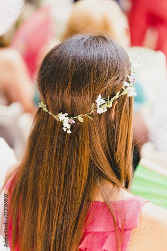 Woman With Straight Hair Combed With A Wreath Of Flowers In Spring