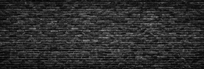 Wall Mural - black brick wall background. stonework texture gloomy, panoramic view