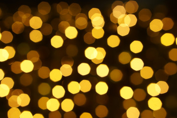 Wall Mural - Abstract blurred and bokeh of party yellow LED reflection lighting on night time background.