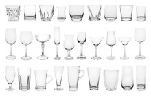 Set Of Different Empty Glasses On White Background