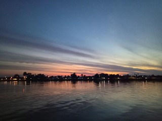 Wall Mural - the sky when the sun will rise in the river