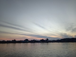 Wall Mural - the sky when the sun will rise in the river