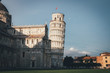 © mehdivir - Pisa cathedral with leaning tower of Pisa behind it