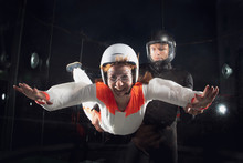 Woman  With  Coach In Wind Tunnel