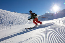 Senior Man Skiing In Winter Landscape