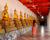 Fototapeta Młodzieżowe - Wat Pho temple and buddhist statues in Bangkok