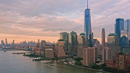 Wall Mural - Slow drone rotation around Lower Manhattan skyline at sunset