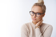 Sensuality, beauty and lifestyle concept. Attractive blond woman in glasses combed hair touching neck and tilting head looking gentle at camera as flirting, expressing relaxation carefree emotions