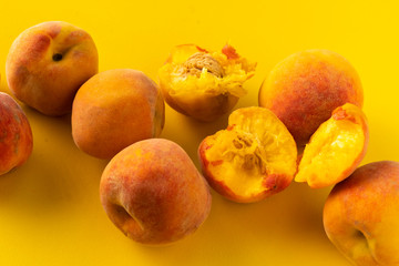 Wall Mural - fresh organic ripe juicy peach and a half isolated, vegeterian snacks