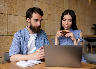 colleagues watching training courses online using laptop computer, internet, modern technology. stud