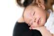 © oktay - baby sleeping on mother shoulder. with white background